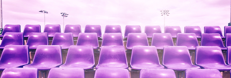 purple chairs set up for a conference